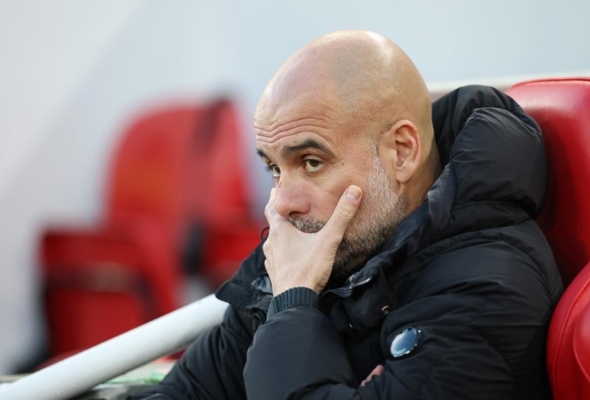 Pep Guardiola phản ứng mỉa mai trước sự chế giễu từ khán giả Liverpool