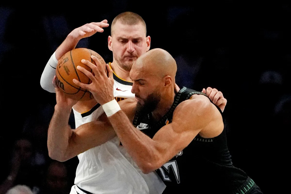 Rudy Gobert phong tỏa Nikola Jokic